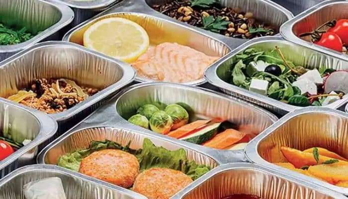 A trays of food in foil
